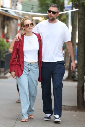 Jennifer Lawrence and Cooke Maroney head home after an early breakfast at La Bonbonniere in West Village in New York City. Jennifer is wearing jeans, white top, red jacket and sandals. The couple walk with their arms around each other on the way home!  Pictured: Jennifer Lawrence,Cooke Maroney Ref: SPL5325126 090722 NON-EXCLUSIVE Picture by: Christopher Peterson / SplashNews.com  Splash News and Pictures USA: +1 310-525-5808 London: +44 (0)20 8126 1009 Berlin: +49 175 3764 166 photodesk@splashnews.com  World Rights