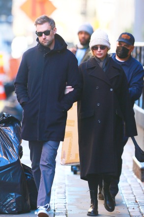 New York, NY  - *EXCLUSIVE*  - Jennifer Lawrence and husband Cooke Maroney were spotted out and about Monday afternoon.  The happy couple  is expecting their first child together. Jennifer has been promoting her latest film Don't Look Up recently and today it seemed she was enjoying a laid back day with her hubby.  Pictured: Jennifer Lawrence, Cooke Maroney  BACKGRID USA 13 DECEMBER 2021   BYLINE MUST READ: T.JACKSON / BACKGRID  USA: +1 310 798 9111 / usasales@backgrid.com  UK: +44 208 344 2007 / uksales@backgrid.com  *UK Clients - Pictures Containing Children Please Pixelate Face Prior To Publication*