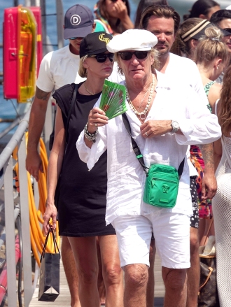 Capri, ITALY  - *EXCLUSIVE*  - Scottish rock and roll star Rod Stewart looks like a character out of 'Pirates of the Caribbean' as he's seen rocking some pearls while out with son Sean and daughter Kimberley on their holiday in Capri. **SHOT ON 08/06/22**  Pictured: Rod Stewart, Sean Stewart, Kimberly Stewart  BACKGRID USA 9 AUGUST 2022   USA: +1 310 798 9111 / usasales@backgrid.com  UK: +44 208 344 2007 / uksales@backgrid.com  *UK Clients - Pictures Containing Children Please Pixelate Face Prior To Publication*