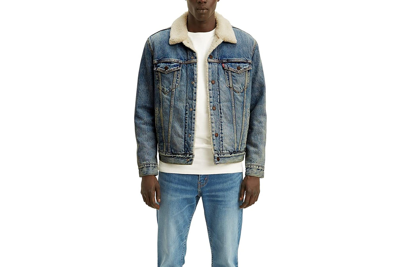 Image may contain: Clothing, Apparel, Jacket, Coat, Sweater, Human, Person, Pants, Vest, and Blazer